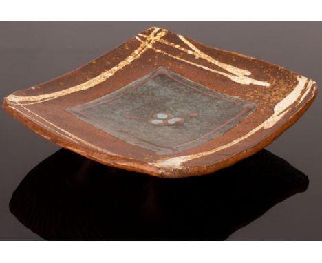 David Frith (born 1943), stoneware rectangular curved dish, tenmoku centre and border of trailed white glazes, impressed mark
