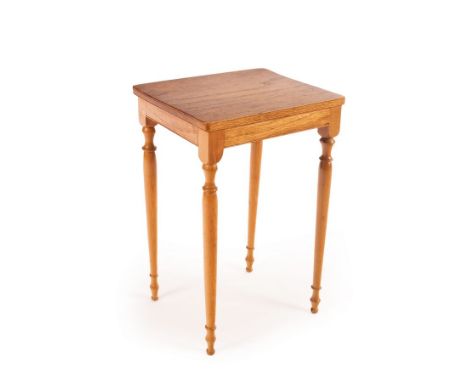 Peter Evans (died 2007), a small oak occasional table, the rectangular top on turned tapering legs, 30.5cm wide, 45.5cm high/