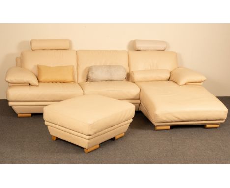 A Natuzzi Italian leather two-seat sofa, chaise longue and ottoman, cream upholstery with wooden barrel feet CONDITION REPORT