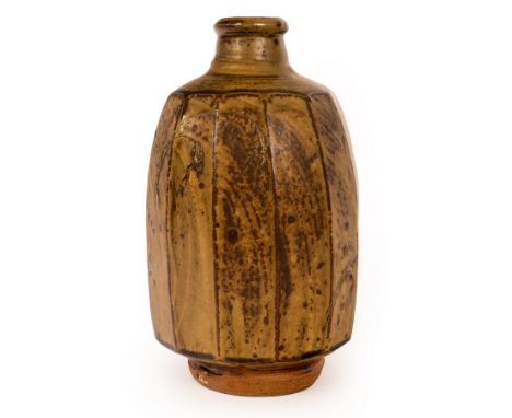 Phil Rogers (1951-2020), stoneware bottle vase with facetted body, green ash glaze, seal mark to base, 28.5cm high CONDITION 