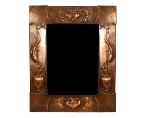 An Arts & Crafts style copper mirror, the frame embossed heart motifs, 46.5cm x 38.5cm overall CONDITION REPORT: Scratches pr