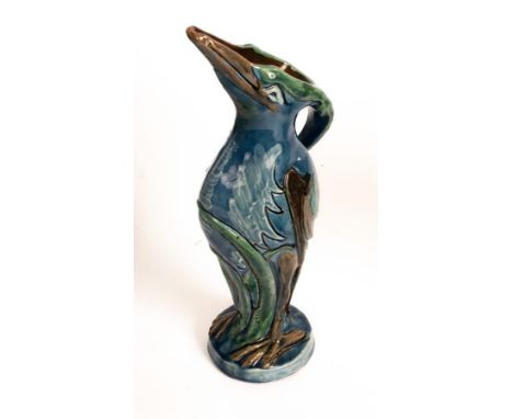 Brannam Barum ware, pottery stork vase of blue, green and brown ground, signed and dated 1889, 25cm high, a blue ground Stanl