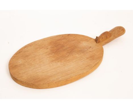 Robert Thompson of Kilburn (1876-1955), a Mouseman cheese board, in oak and of oval form, carved mouse signature to handle, 3