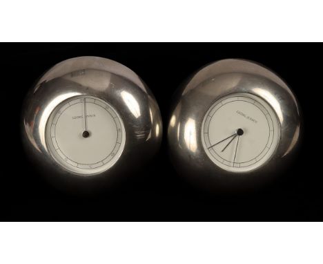 Georg Jensen, a pewter circular clock and matching barometer/thermometer, the backs with moulded mark, design by Andreas Mikk