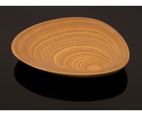 Tapio Wirkkala (1915-1985), a laminated birch plywood leaf dish, 1950s, produced by Soinne et Kni in Finland, TW monogram etc