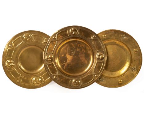Attributed to Margaret Gilmour (1863-1942), Glasgow School, a brass charger decorated Celtic designs, 48cm diameter, another 