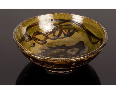 Bernard Forrester (1909-1990), stoneware bowl, ash glaze painted with stylised fish, signed, 19cm diameter CONDITION REPORT: 