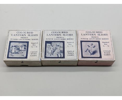 COLOURED LANTERN SLIDES:&nbsp;Uncle Tom's Cabin. Complete, contained in 3 original printed boxes with accompanying sheets of 