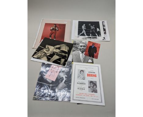 BOXING:&nbsp;small quantity of photographs and boxing programmes, inc. signed full length portrait of Frank Bruno, mounted. (