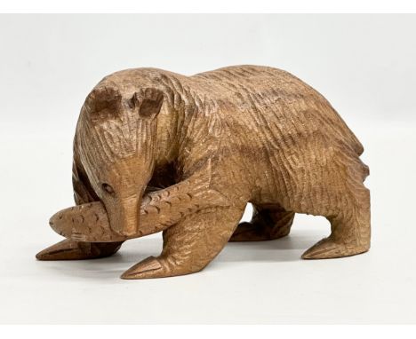 A vintage East European/Russian carved linden wood bear. 17x11cm.