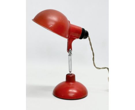 A 1950’s industrial folding desk lamp by Grail.