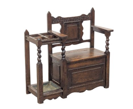 An Early 20th Century oak combination bench / stick stand. 93x90cm