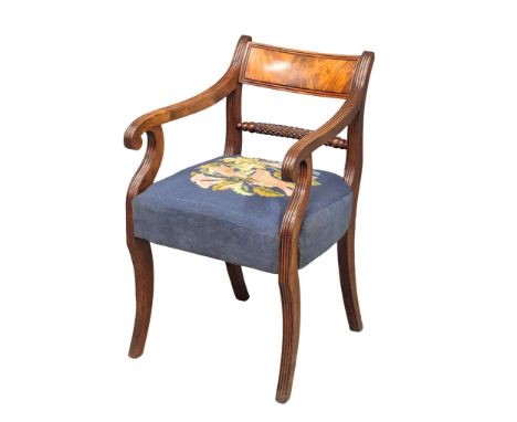 An Early 19th Century Regency Period mahogany armchair with tapestry seat on Sabre legs. (3)