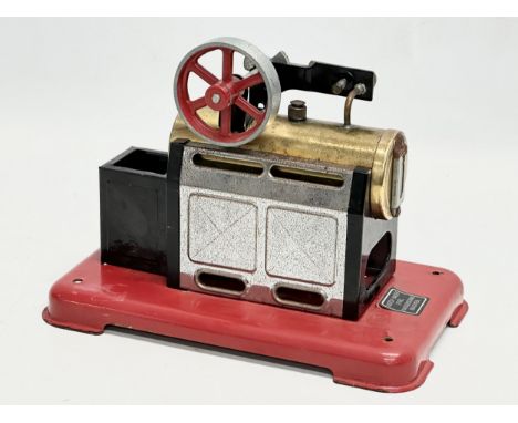 A vintage Momod Stationary Steam Engine.