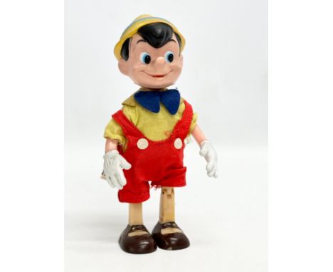 A 1960’s R. Dakin &amp; Company Pinocchio doll. 20cm