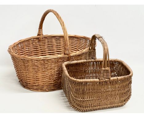 2 vintage wicker baskets. 53x38x42cm. 36x29x35cm