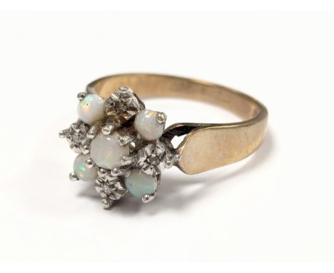 A 9ct gold and opal cluster ring. 3.6g. Size UK N