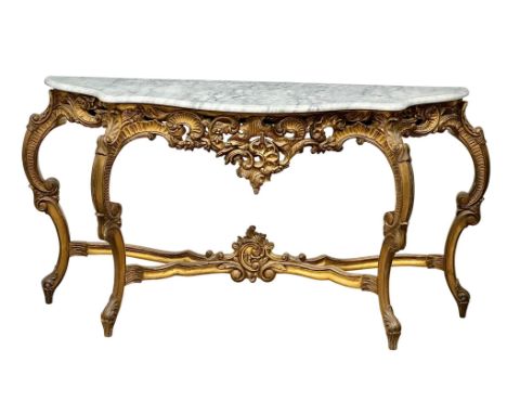 A large 18th Century style gilded console table with marble top in the style of Louis XV. 148x45x80cm