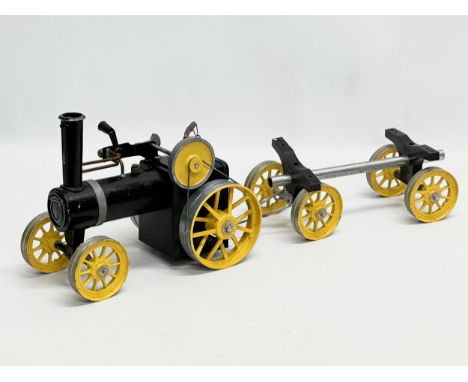 A vintage Momod Steam Engine Tractor and Trailer.