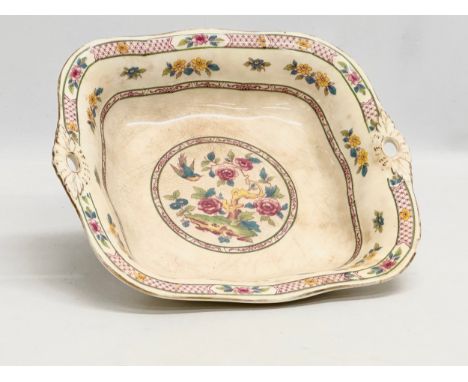 Crown Staffordshire for R. Hogg &amp; Co. An Early 20th Century pottery dish. Circa 1906-1910. 22.5x21.5x4cm
