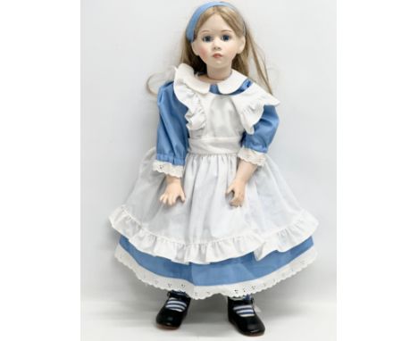 A rare 1995 SCS/MDA Alice in Wonderland porcelain doll. Marked M. Ratcliffe. 62cm