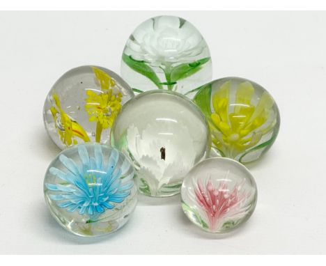 6 vintage art glass paperweights.