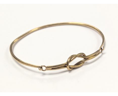 A 9ct gold bangle. 5.5g