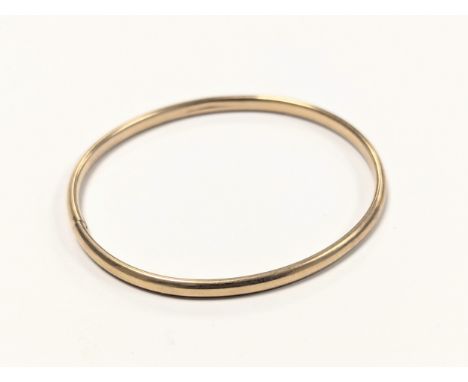 A 9ct gold bangle. 4.5gr