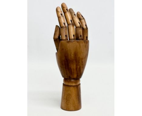 A vintage wooden ring display hand. 25cm