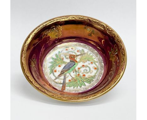 A 1930’s Mintons lustre bowl. Hand painted, with enamel butterflies and bird design. 14x3cm.