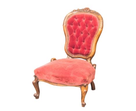 A 19th Century Victorian walnut framed deep button back bedroom chair / ladies chair