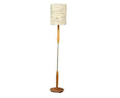 A Mid Century teak standard lamp. 176.5cm.