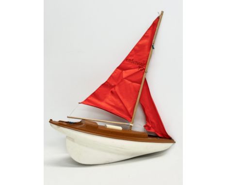 A vintage plastic pond yacht. 41x48cm