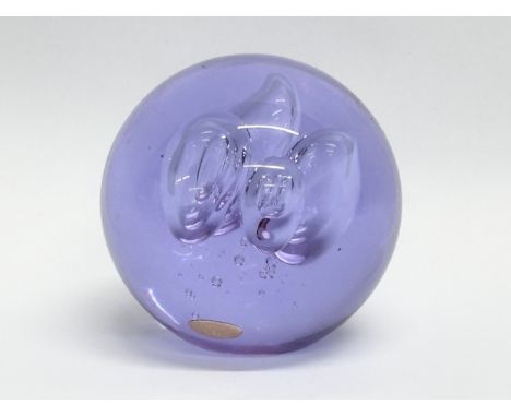 A vintage Czechoslovakian glass paperweight. 7x8cm
