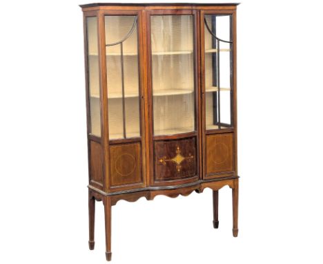 An Edwardian inlaid mahogany display cabinet with bow front panel. 109x34x174cm
