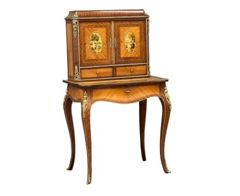 A good quality Louis XV style inlaid kingwood Bonheur De Jour desk, with ornate gilt brass mounts and painted panel doors. 2 