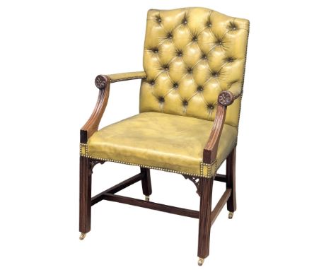 A good quality 18th Century style deep button back leather Gainsborough style elbow chair.(2)