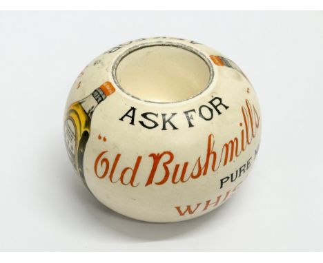 An Early 20th Century Old Bushmills Whiskey advertising match holder/match striker. By Shelley.