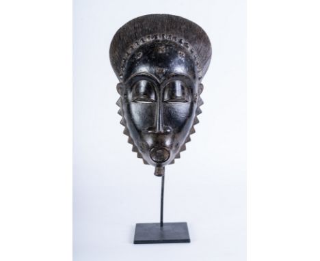 African art Portrait mask, BauleIvory Coast. . Cm 22,00 x 33,00. Wooden mask in dark patina with elegant features. This mask 