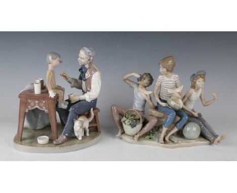 Two Lladro figure groups, comprising Sweet Harvest, No. 5380, and The Puppet Painter, No. 5396 (lacking paintbrush).