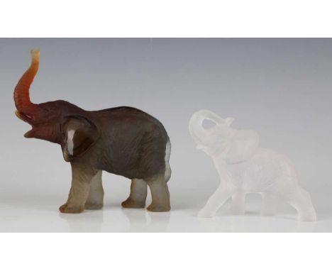 A Daum frosted amber glass model of an elephant with raised trunk, contemporary, designed by Jean-François Leroy, engraved 'D