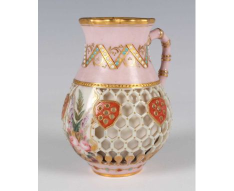 A Royal Worcester reticulated jug, dated 1875, the double-walled body pierced with a honeycomb design heightened with gilt do
