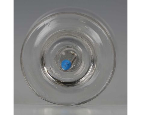 A light baluster stem sweetmeat glass, circa 1730-40, the everted lip ogee bowl above a beaded knop on an inverted baluster s