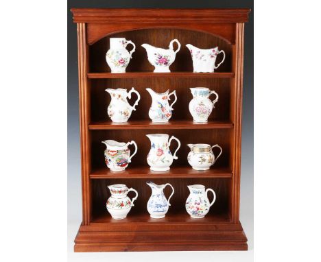 A set of twelve Royal Worcester Historic Jugs Collection jugs, each replicating an original 18th century shape and pattern, p
