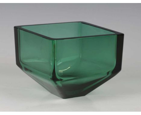 An Orrefors Expo glass bowl, designed by Sven Palmqvist, the green tinted body of square shape, raised on a tapered foot, eng