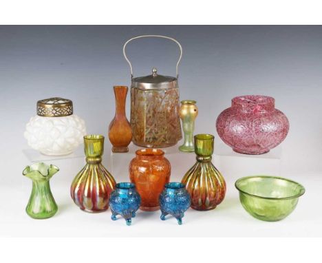 Two pieces of Loetz Crete Rusticana pattern iridescent glass, circa 1899, comprising a vase with frill rim, height 10.5cm, an