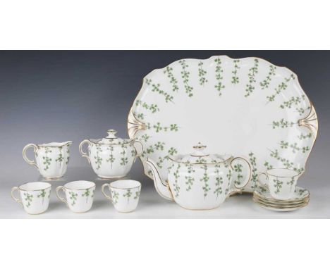 A Royal Crown Derby cabaret set, dated 1906-08, decorated with trailing vertical black stems of green flowers and leaves, pat