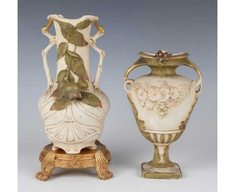 Two Royal Dux two-handled vases, early 20th century, the first of Art Nouveau style, decorated in high relief with rose hips 