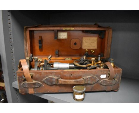 An antique surveyors or architects Theodolite/instrument in wood and leather case,E R Watts and son Ltd, Camberwell, London.