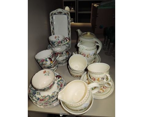 A selection of tea cups and saucers including Wood and sons Brier and Royal Cauldon Victoria